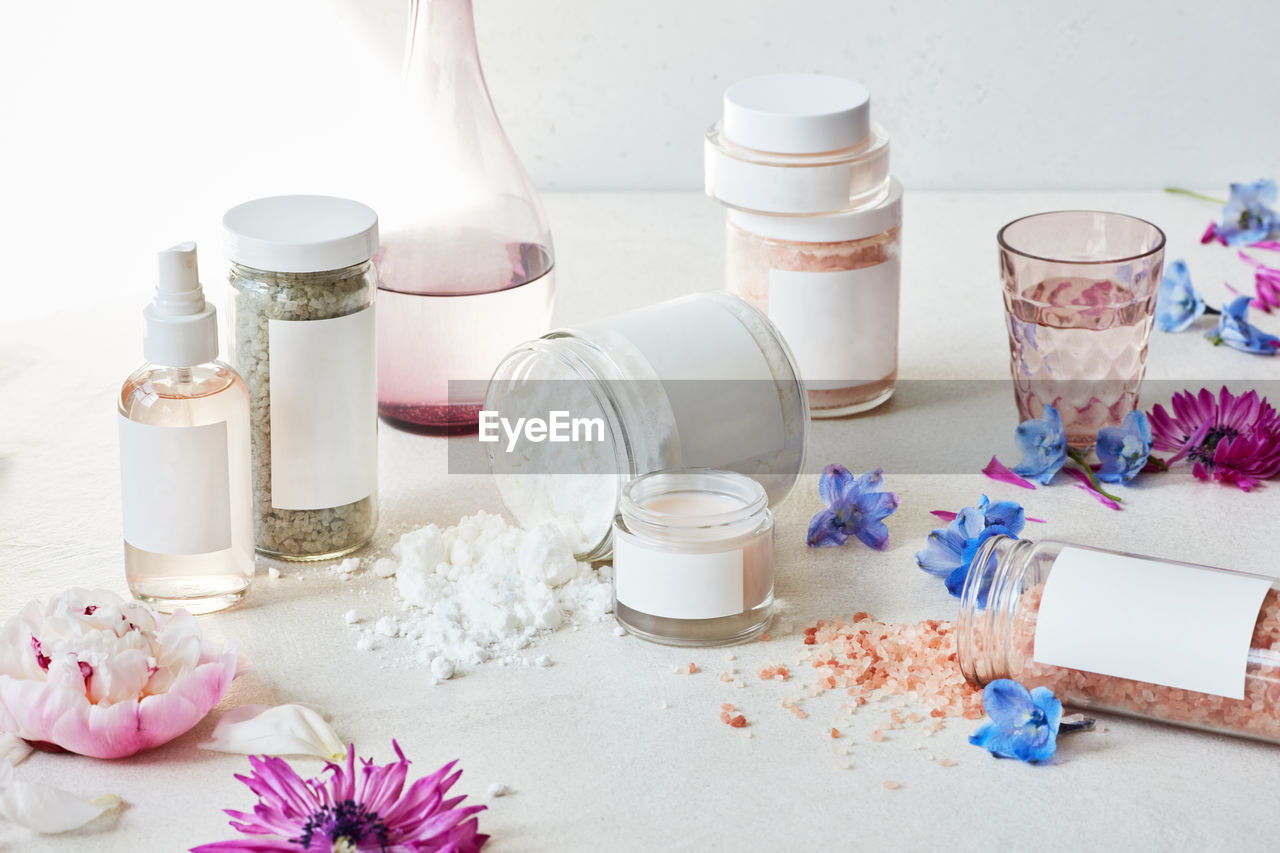 Collection of bath salts with flowers