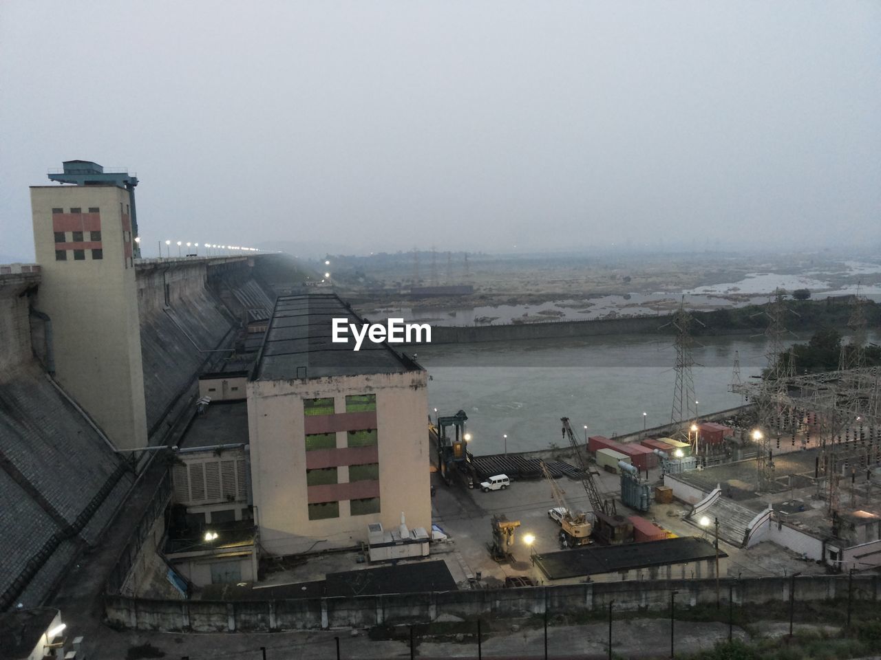 High angle view of dam against clear sky at dusk