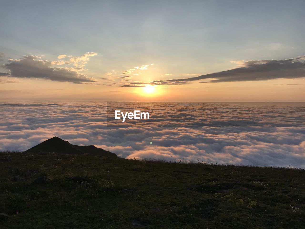 SCENIC VIEW OF SUNSET OVER LAND