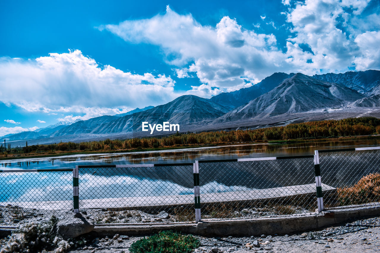 VIEW OF SNOWCAPPED MOUNTAINS AGAINST SKY