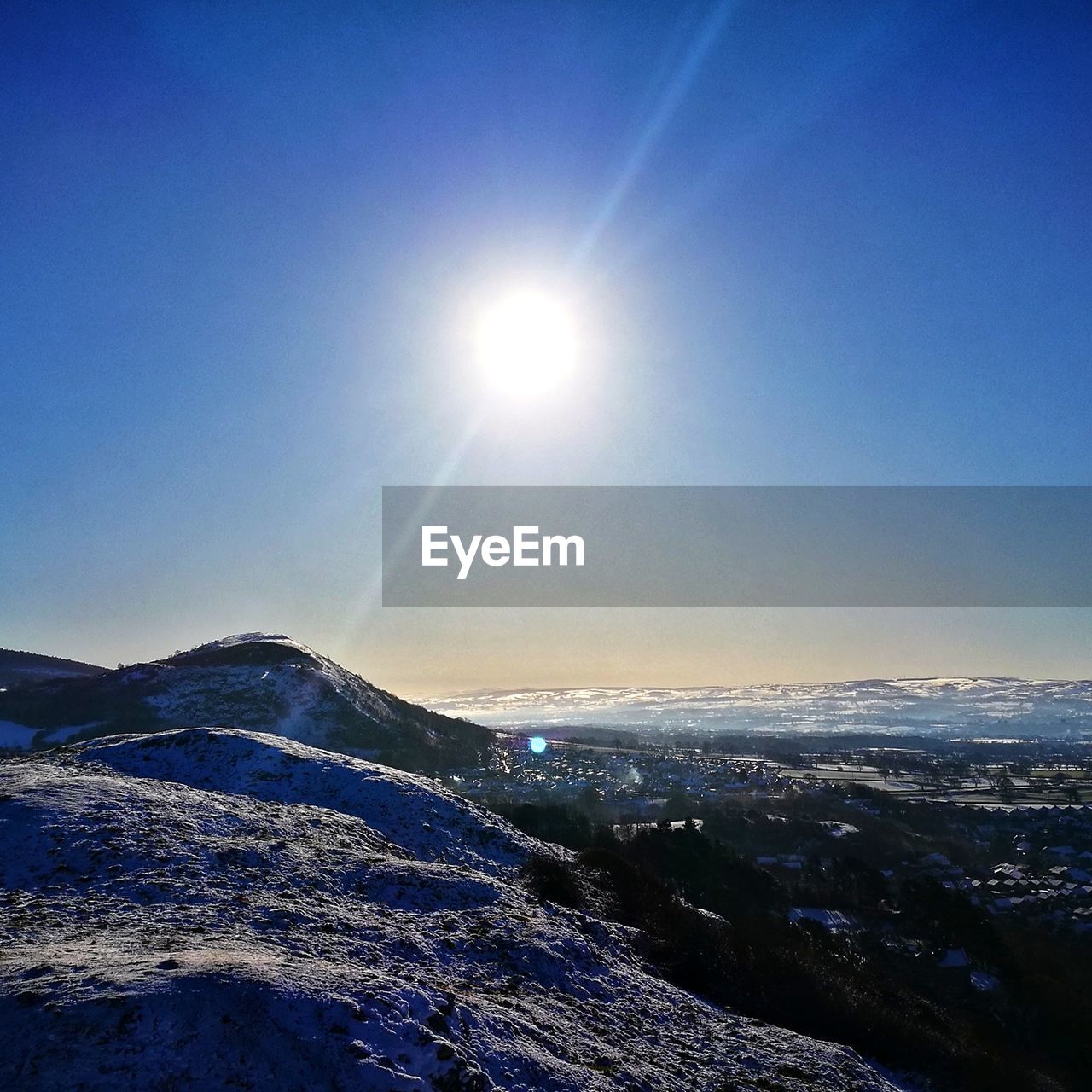 SCENIC VIEW OF SNOWCAPPED MOUNTAINS AGAINST CLEAR SKY