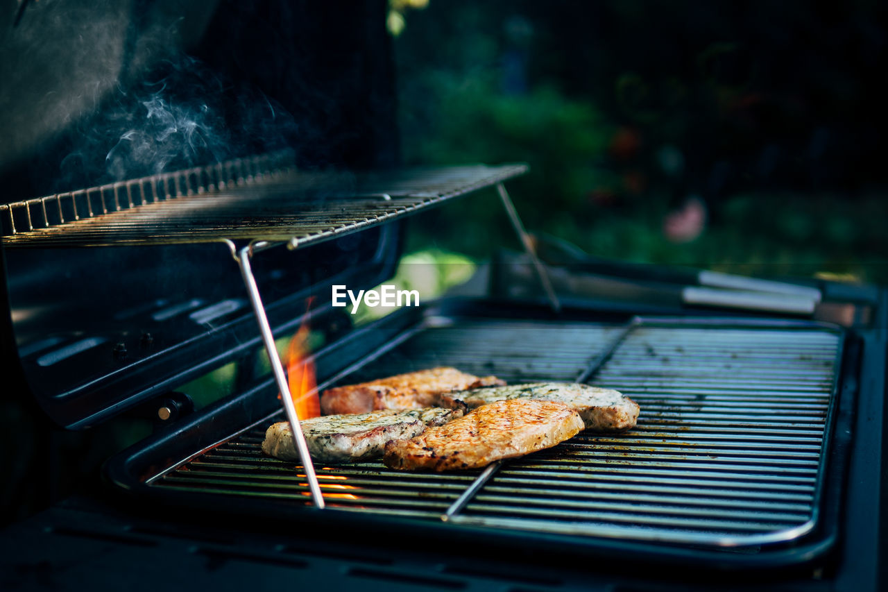 Close-up of meat on barbecue grill