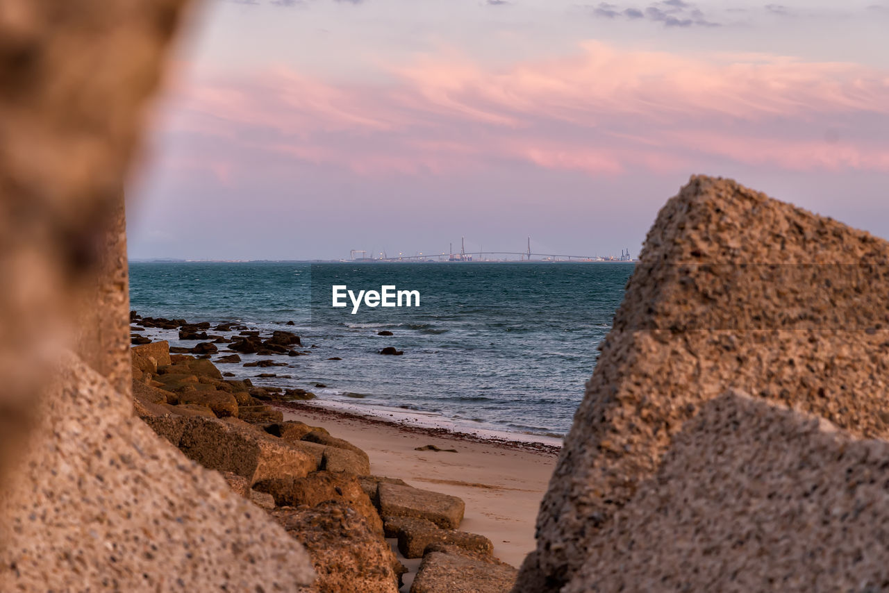 Scenic view of sea against sky during sunset