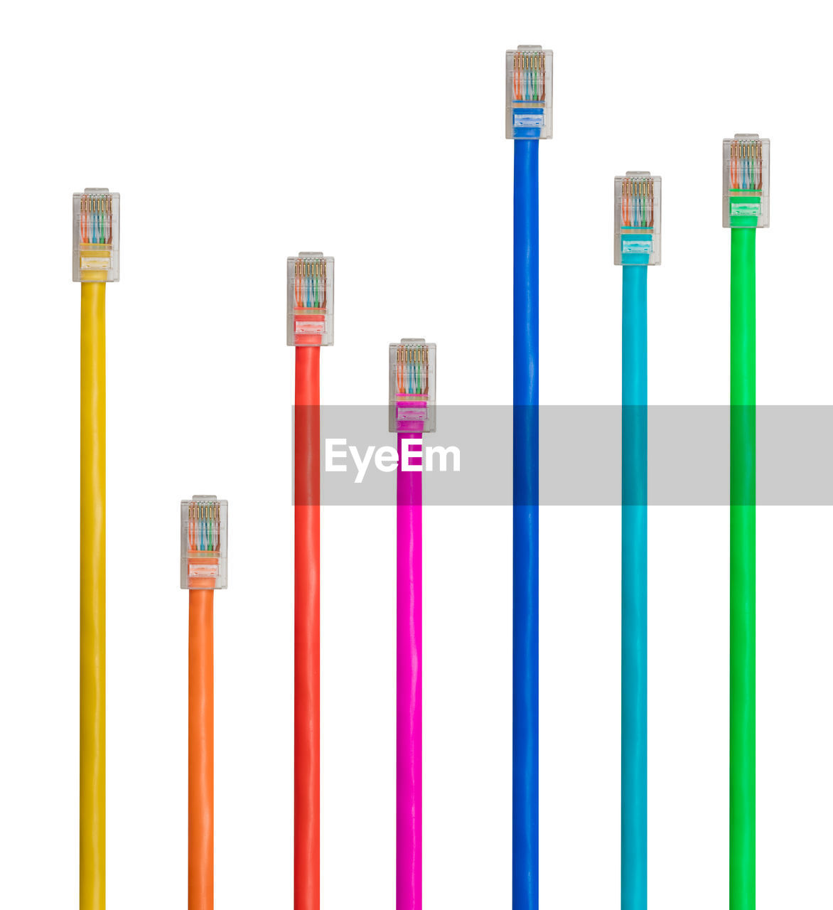 Close-up of colorful cables over white background