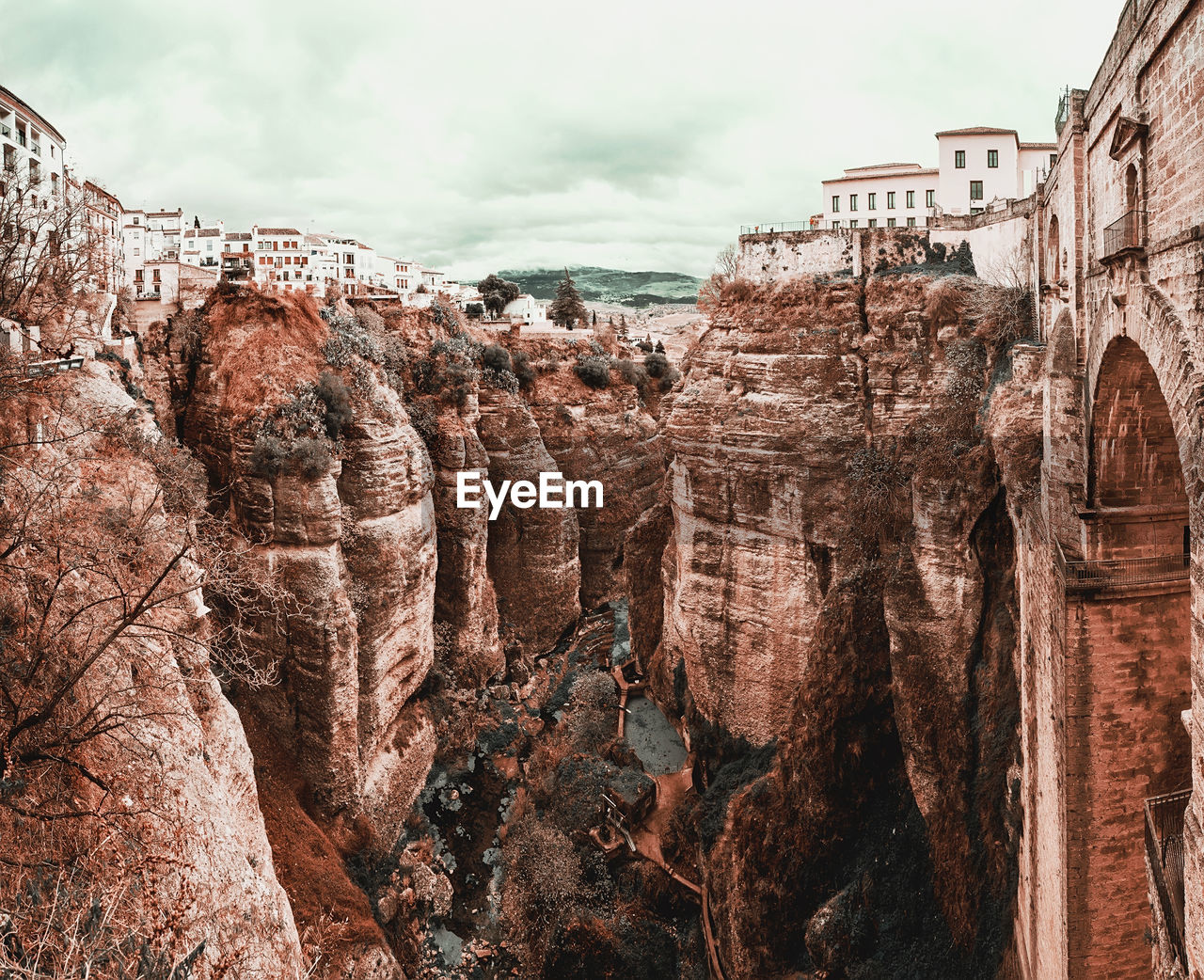 High angle view of buildings on rock formation against sky