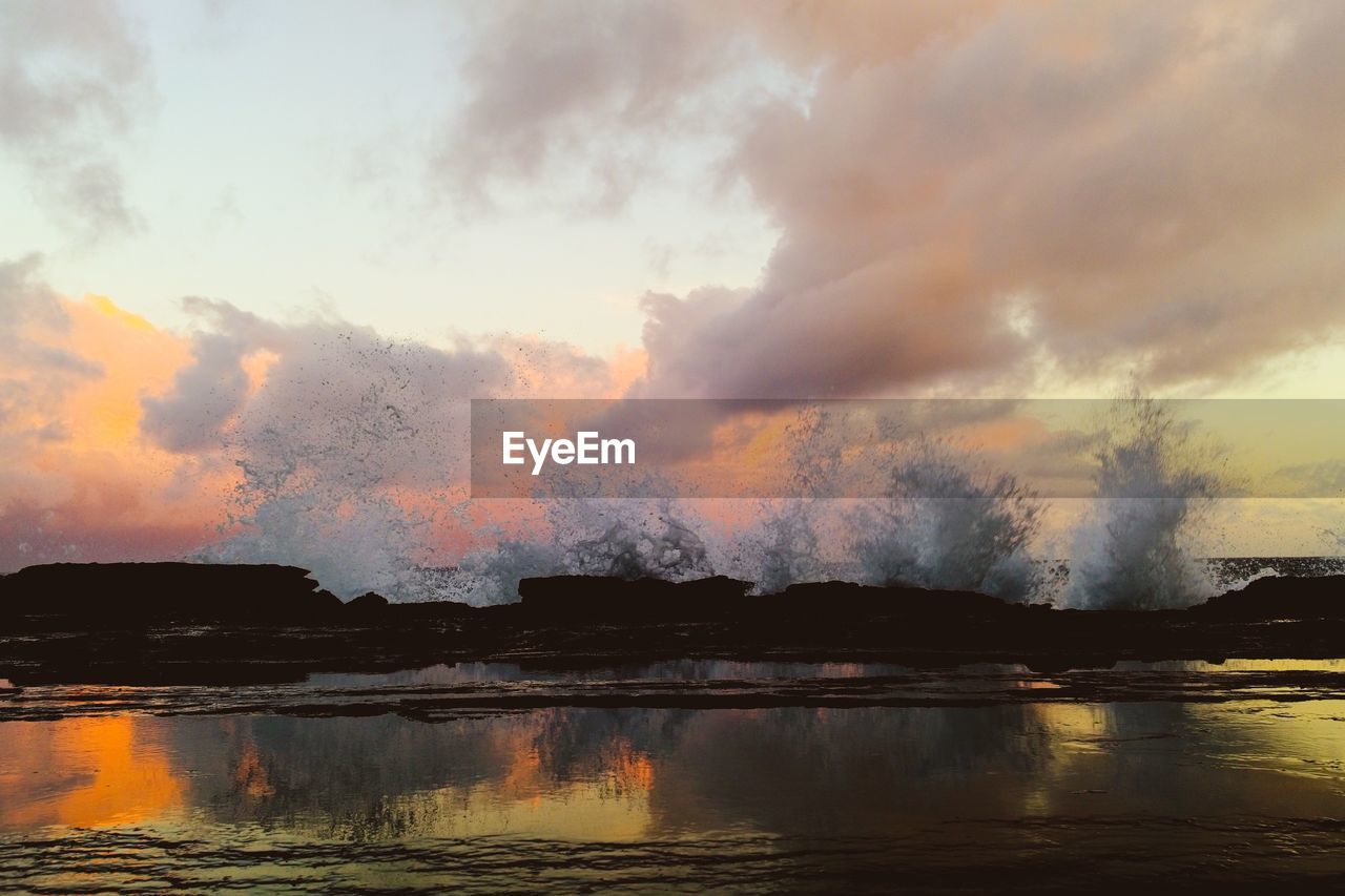 Panoramic view of sea against sky during sunset