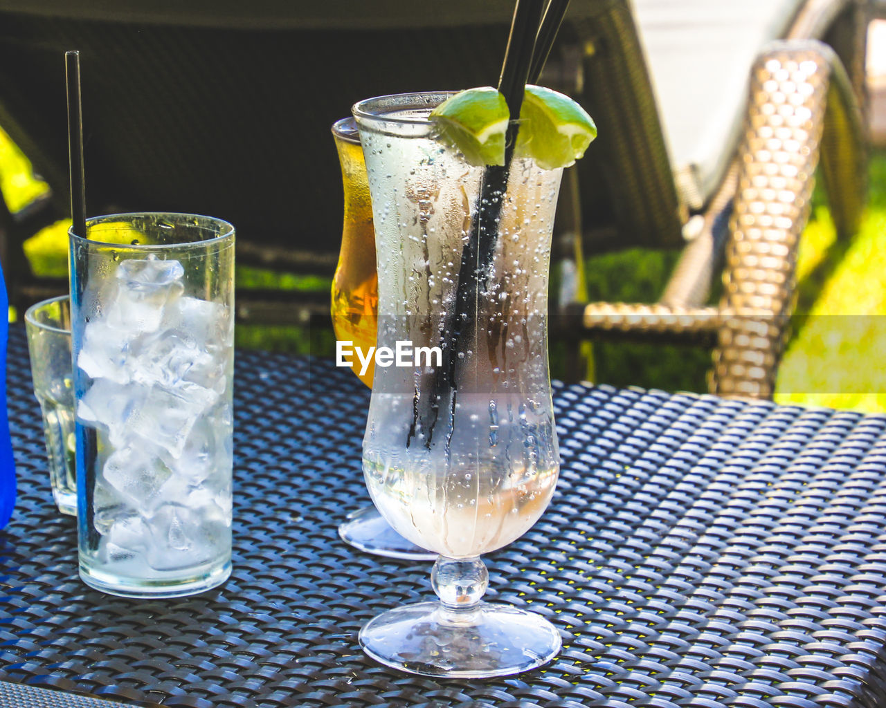 CLOSE-UP OF DRINK ON TABLE