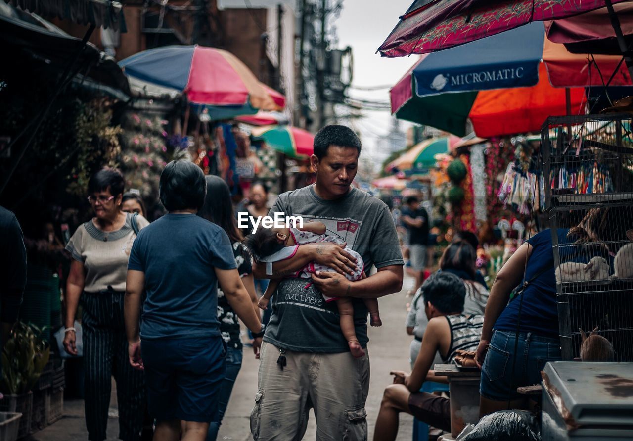 PEOPLE AT STREET MARKET