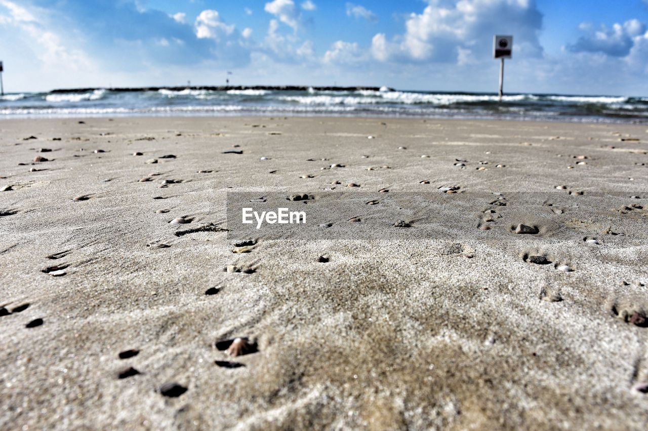 Scenic view of beach against sky