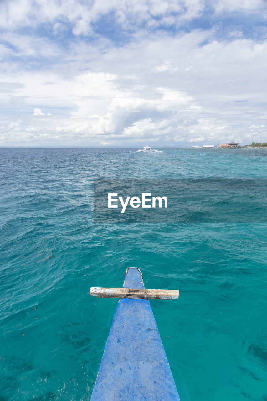 Boat in sea against sky