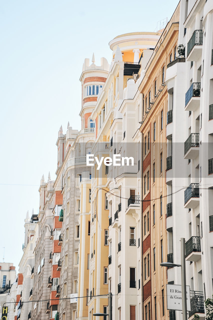 LOW ANGLE VIEW OF BUILDINGS