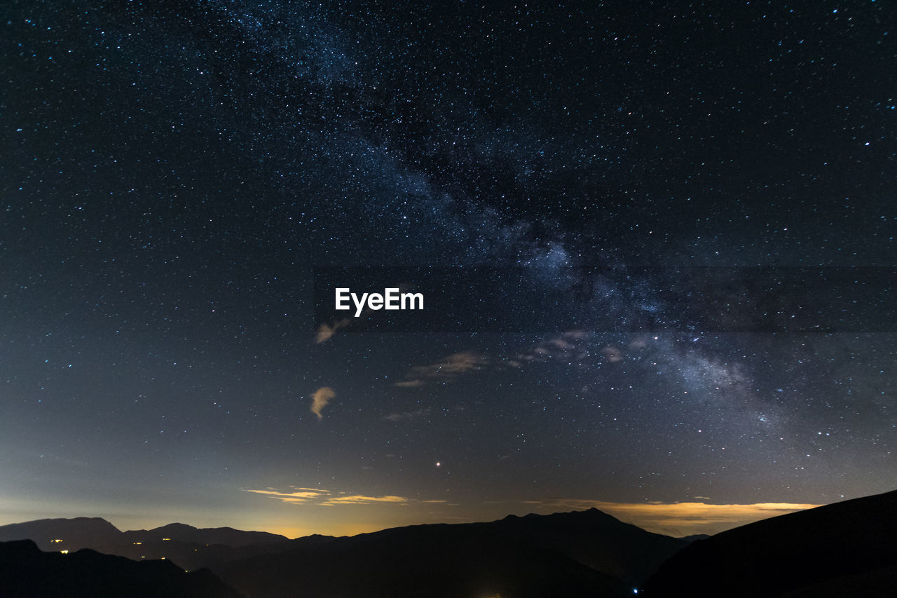 Scenic view of star field against sky at night