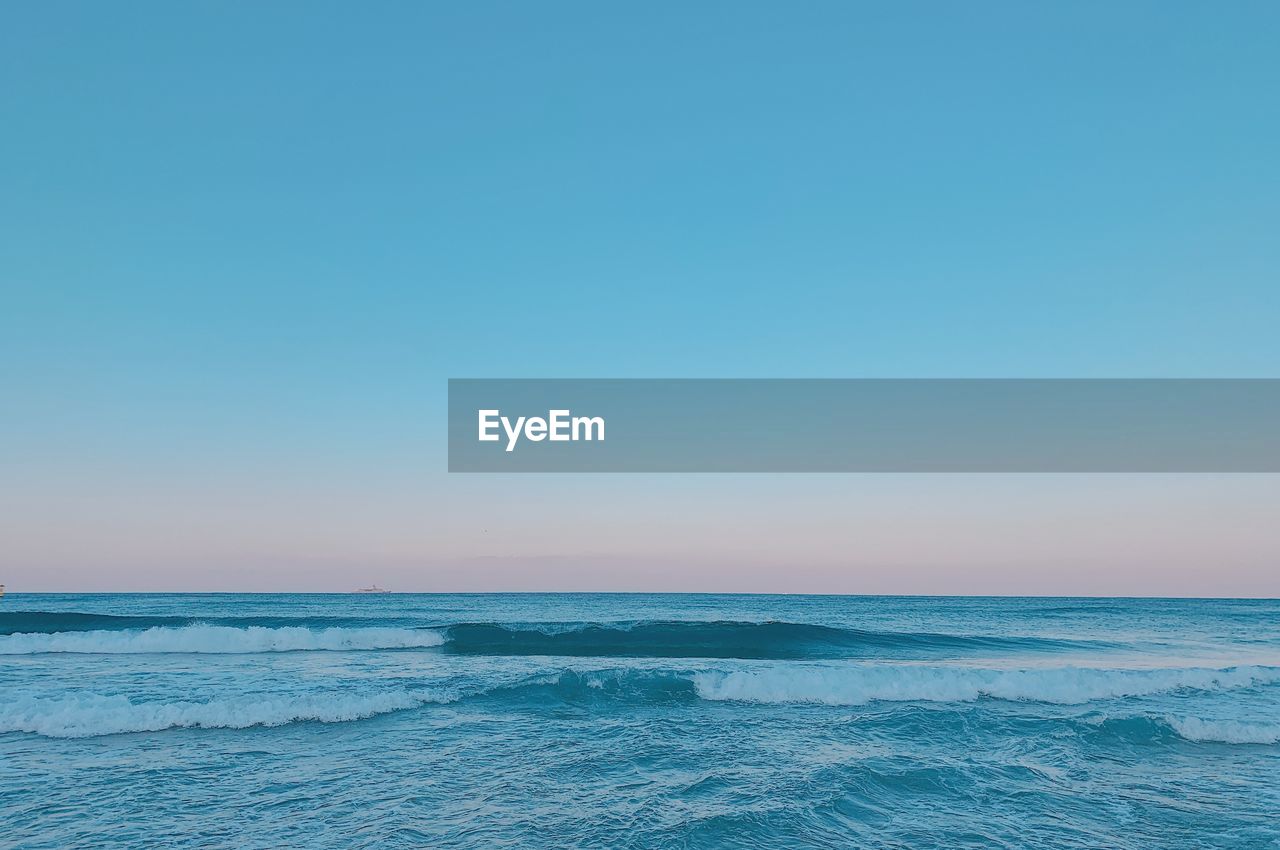 SCENIC VIEW OF SEA AGAINST BLUE SKY