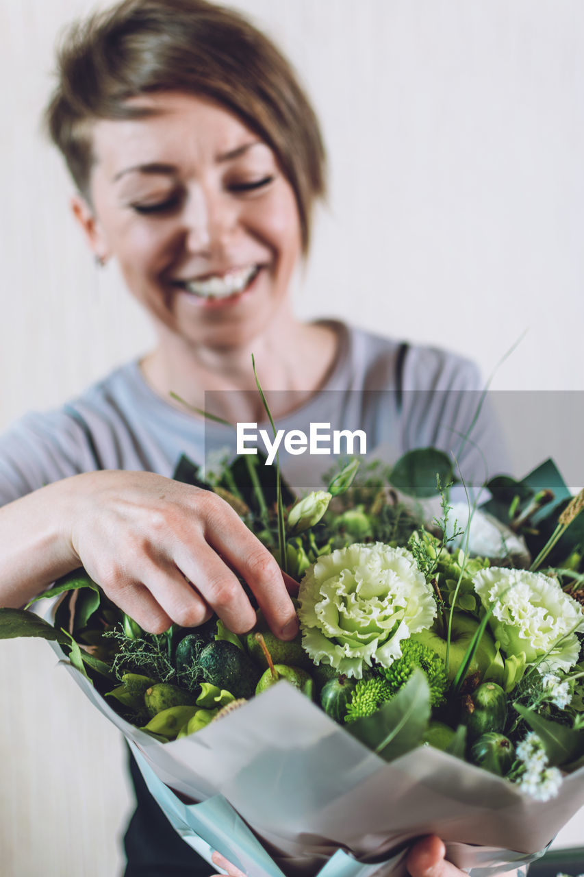 Midsection of woman holding food