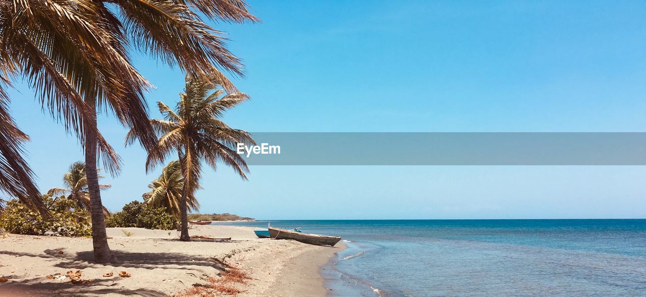 Scenic view of sea against clear sky