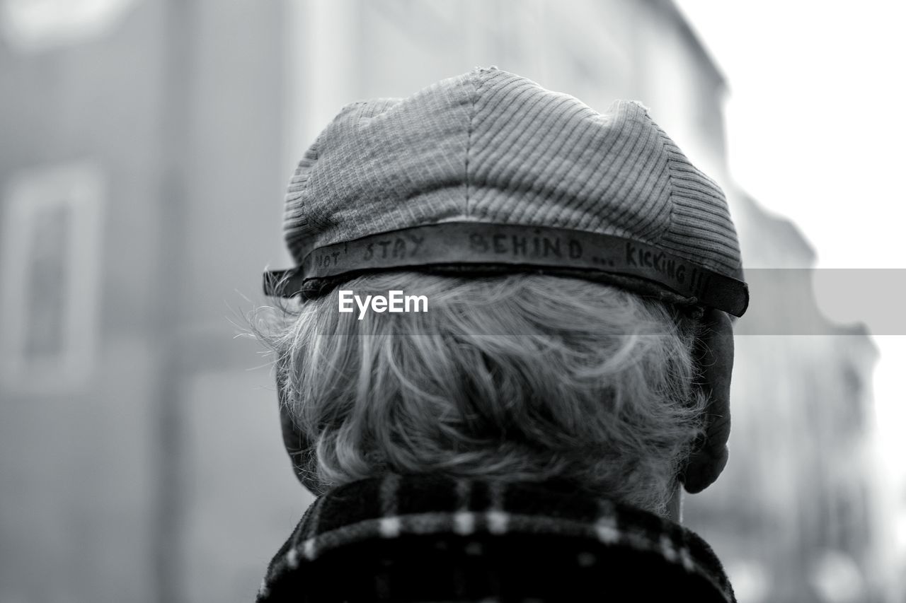 Rear view of senior man wearing cap