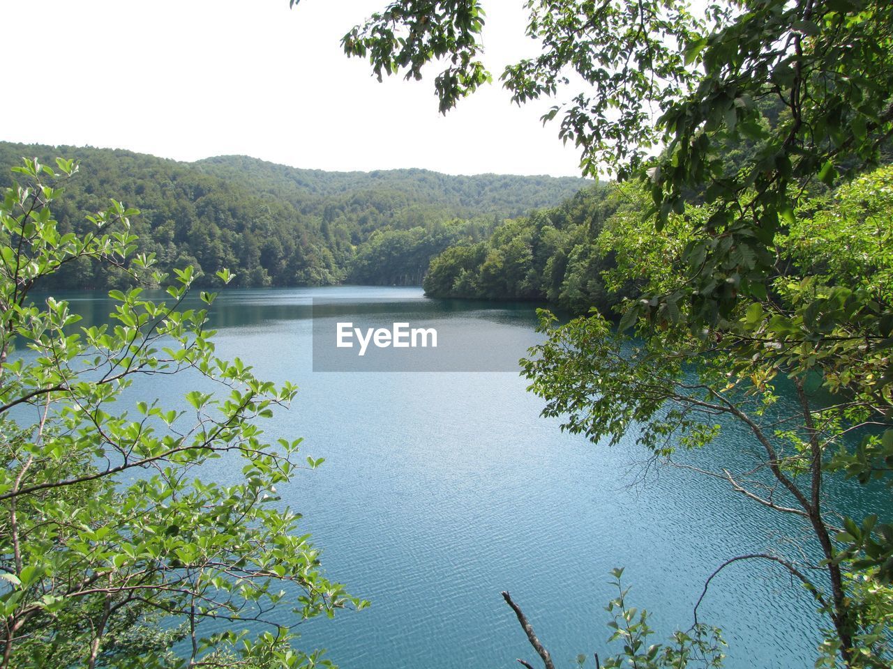 Scenic view of lake and mountains at plitvice lakes national park