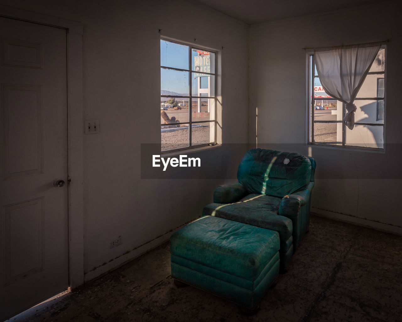 View of chair in abandoned home