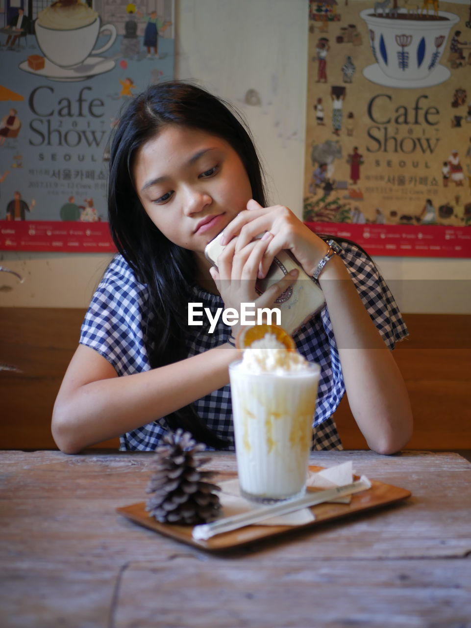 Young woman drinking glass