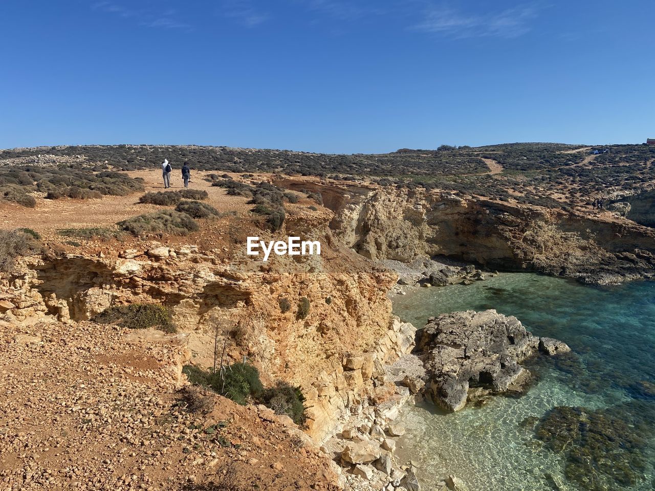 SCENIC VIEW OF ROCKS AGAINST SKY