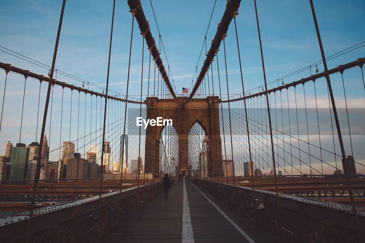 Brooklyn bridge against sky in city