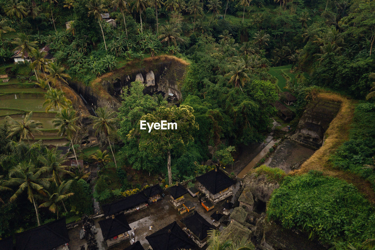 Aerial shot of candi tebing gunung kawi tampaksiring with local balinese preparing ceremony