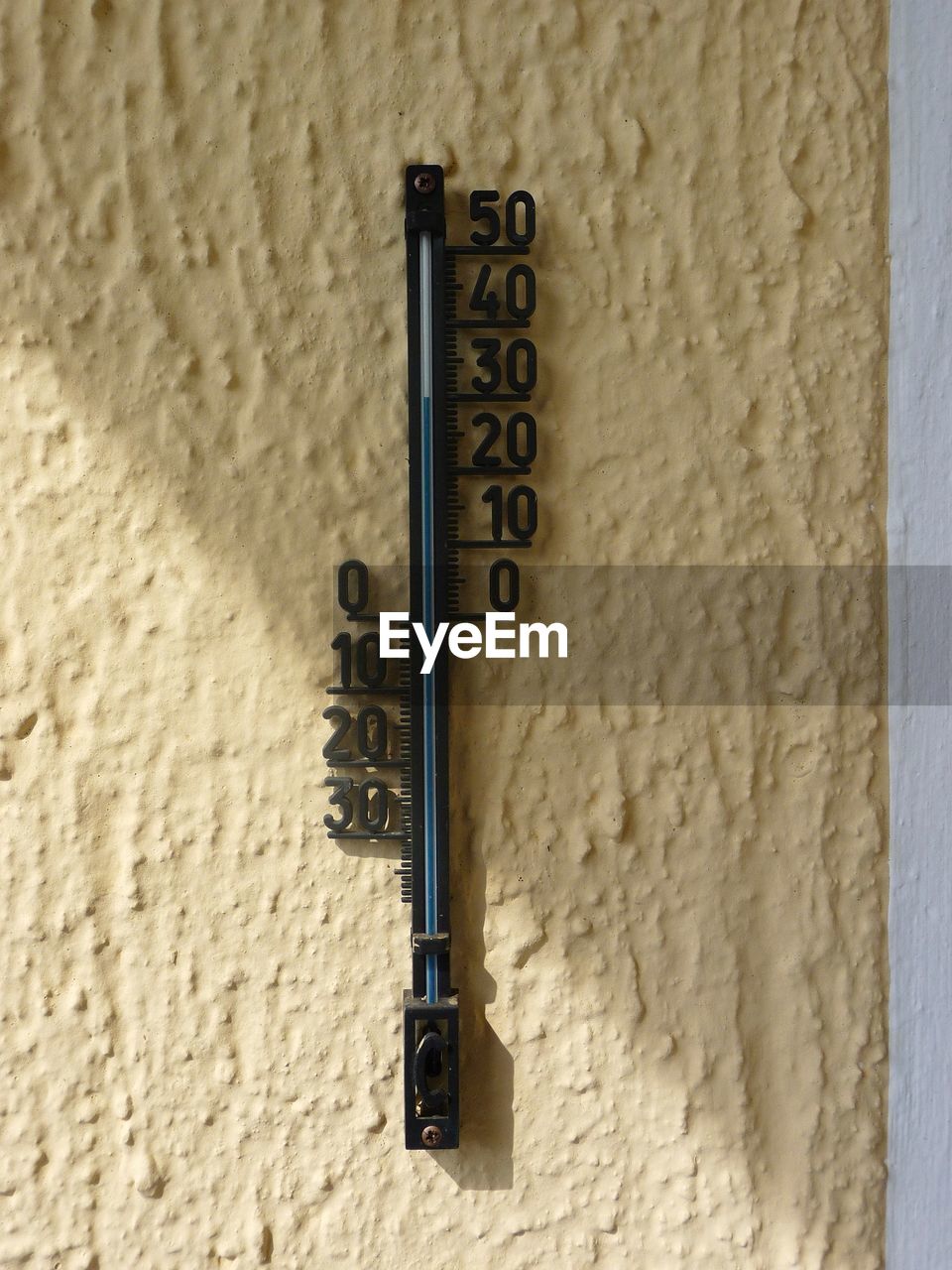 Close-up of thermometer on wall