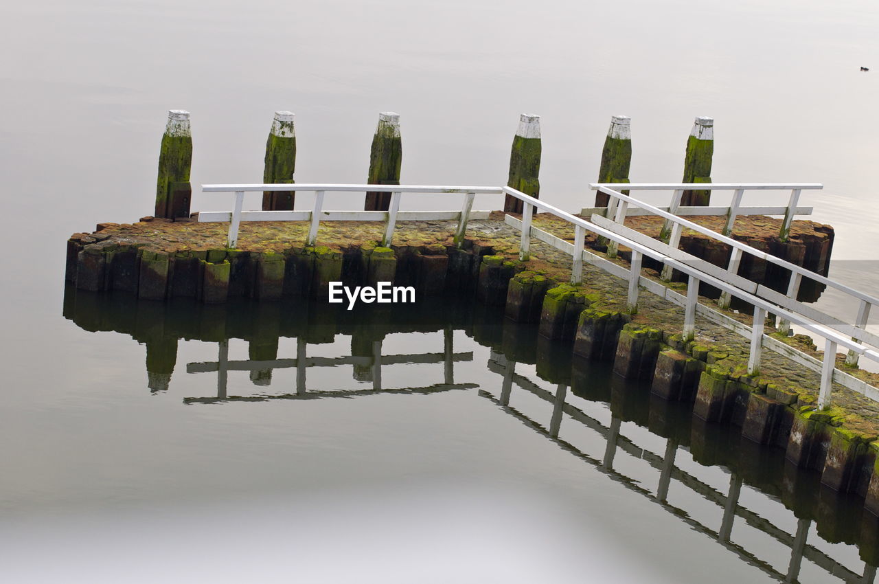 High angle view of pier by lake