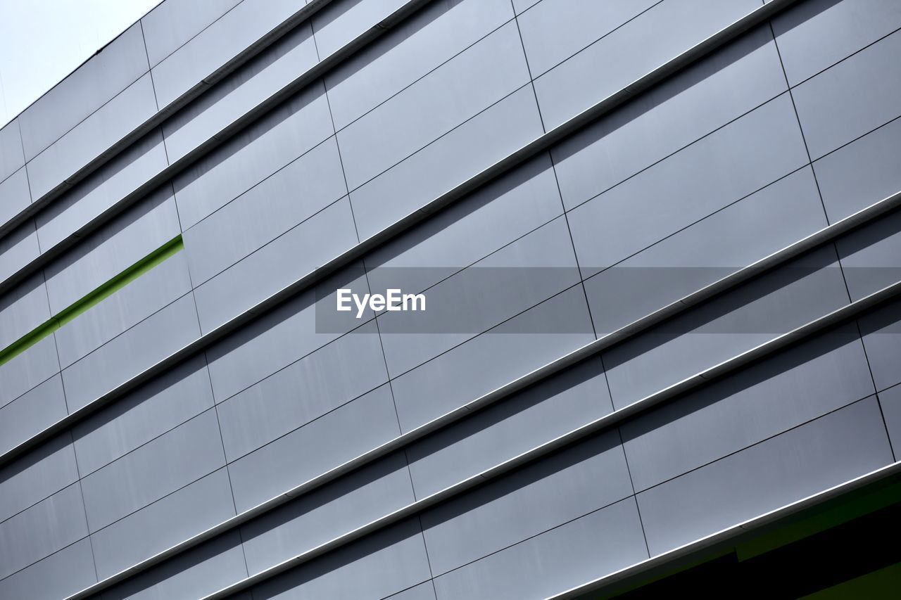 Low angle view of modern building against sky