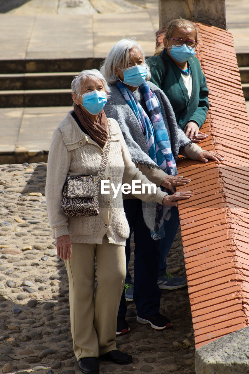 Group of women travelling. famous historic bridge of boyaca in colombia. colombian independence .