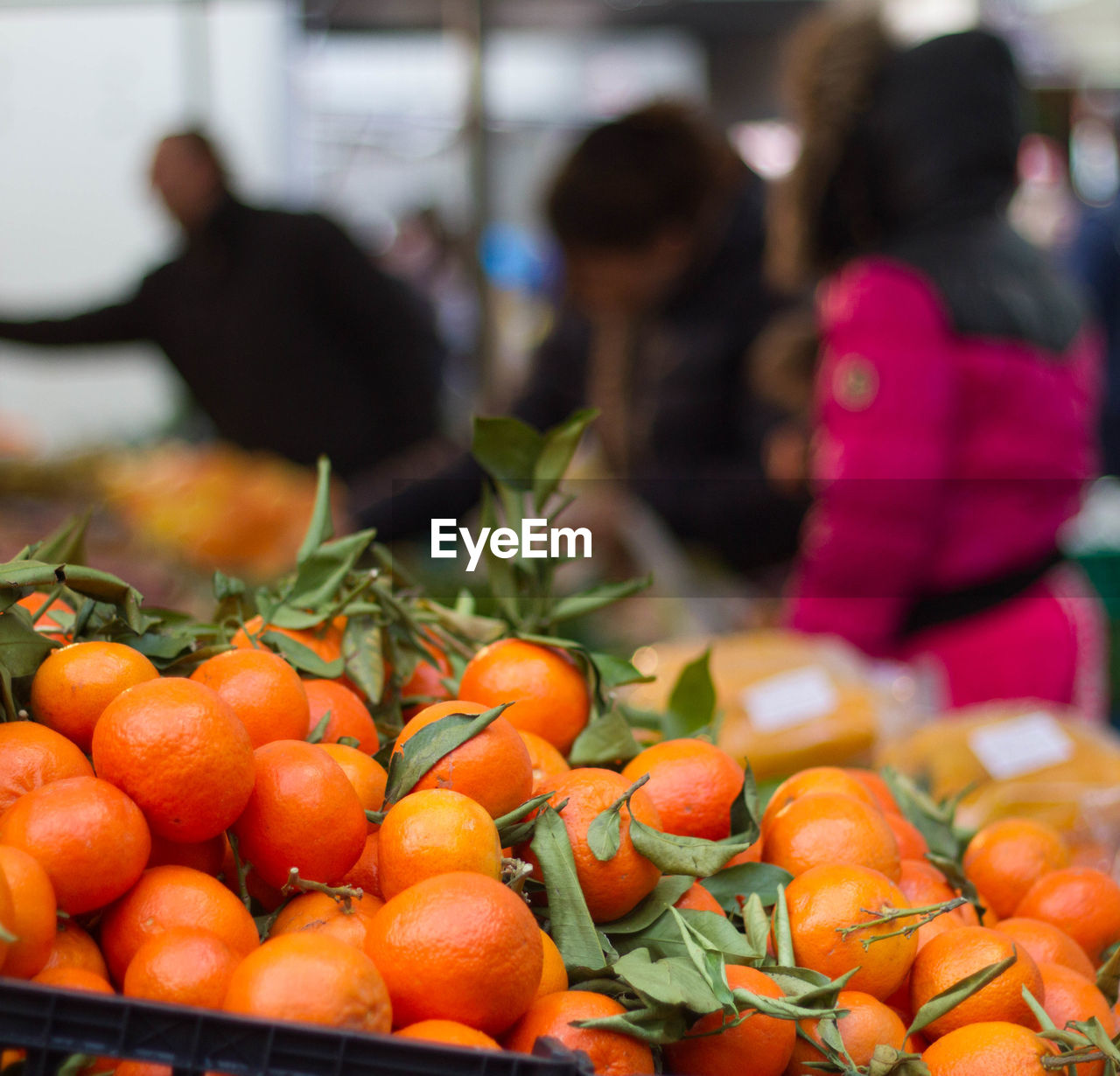 Close-up of oranges for sale at market stall