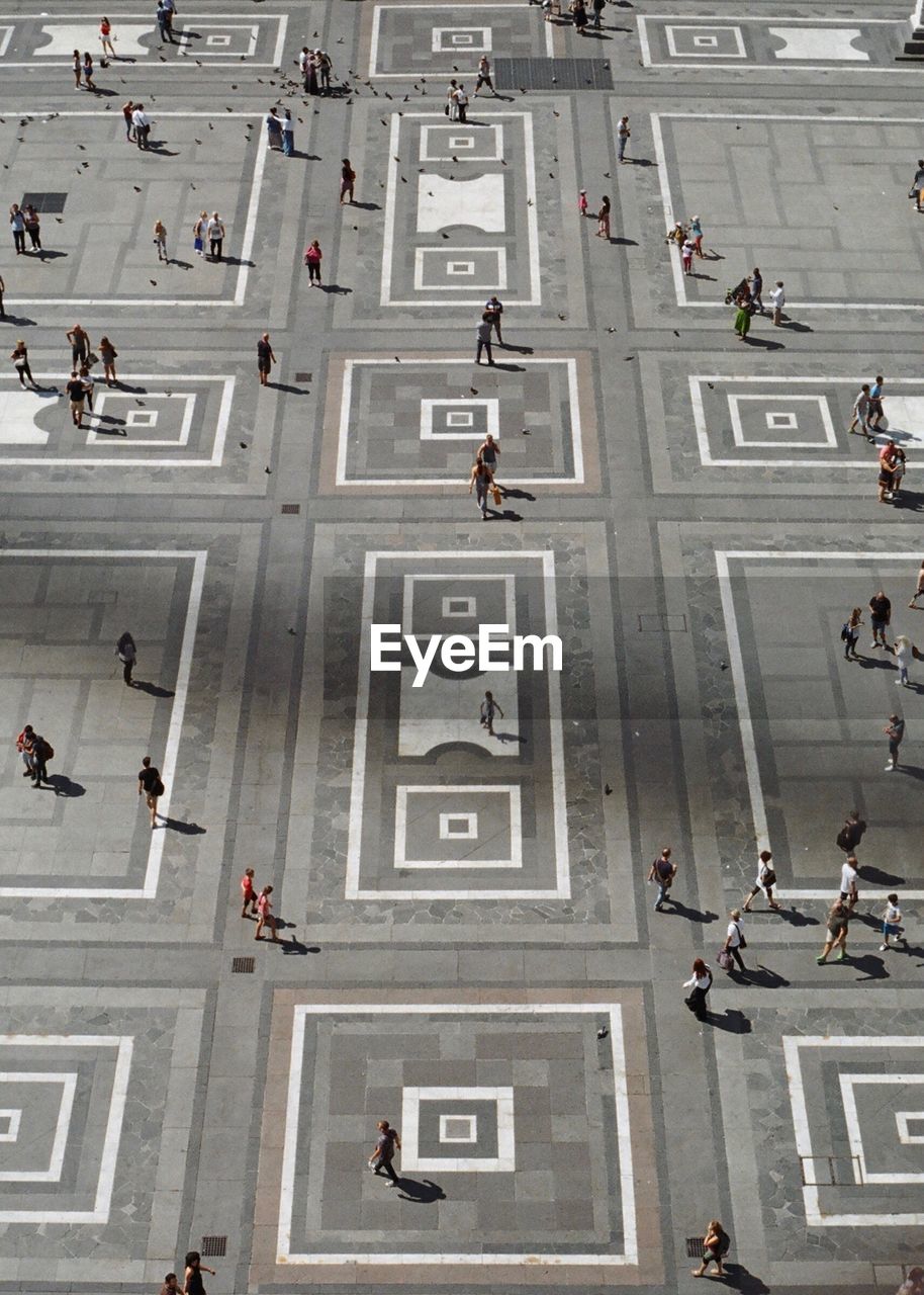 High angle view of people walking on street