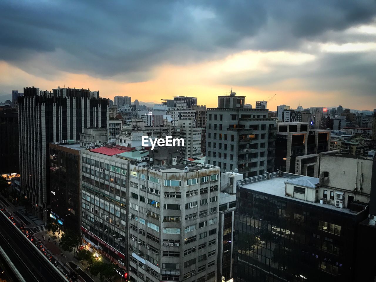 Cityscape against sky during sunset