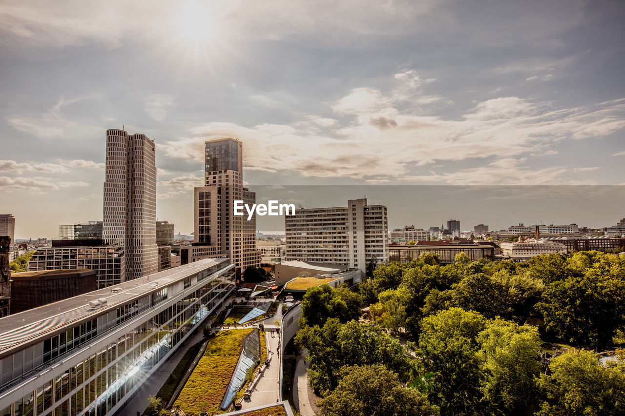 HIGH ANGLE VIEW OF BUILDINGS AGAINST SKY