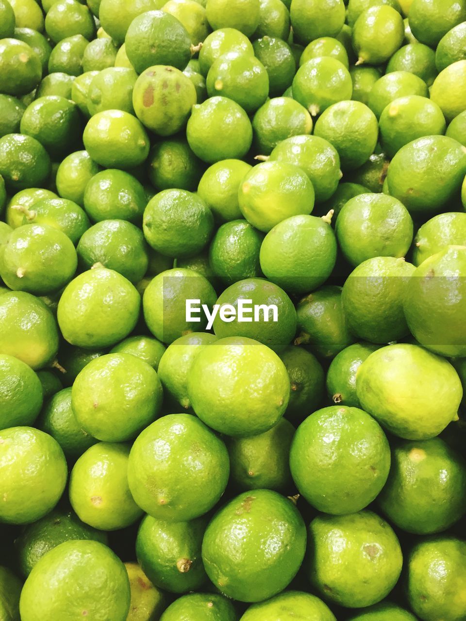 Full frame shot of lemons in market