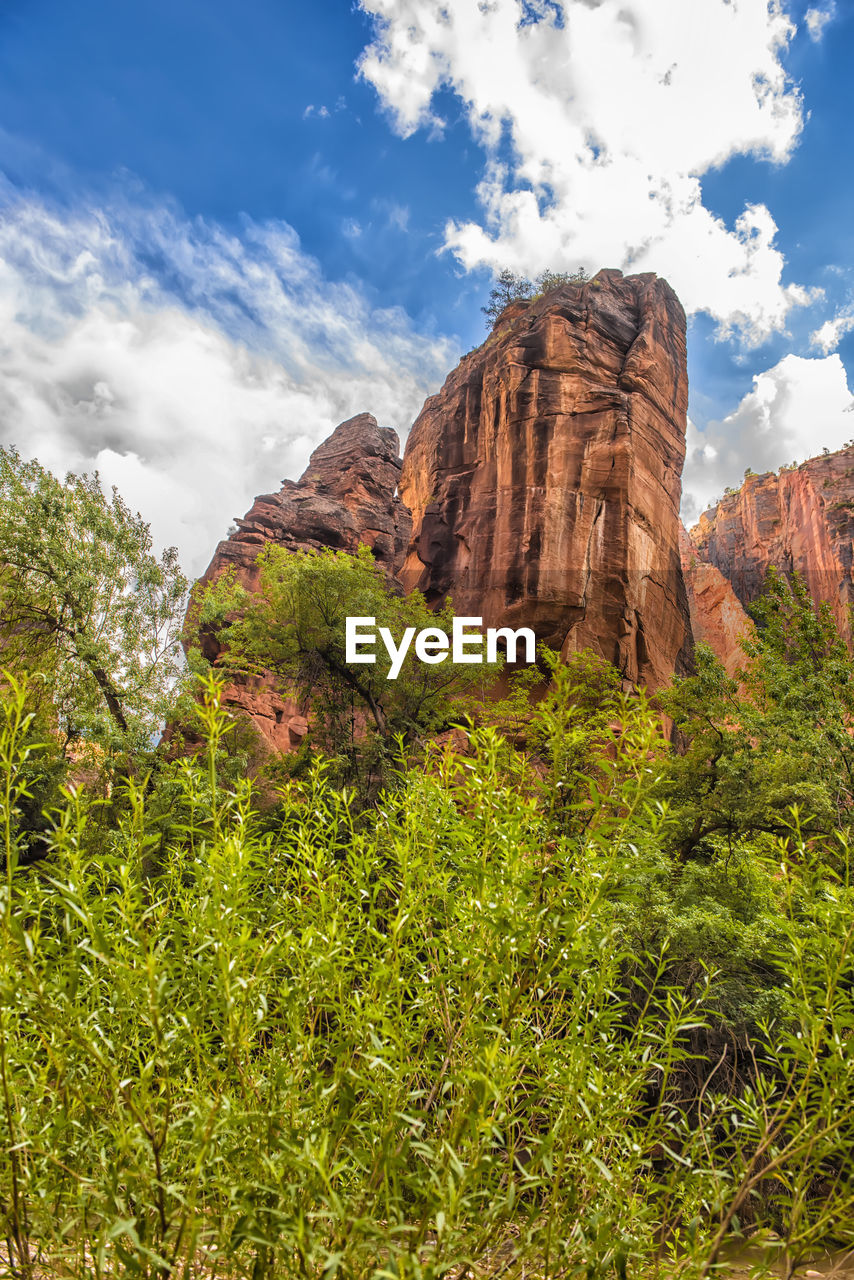 LOW ANGLE VIEW OF ROCK FORMATIONS