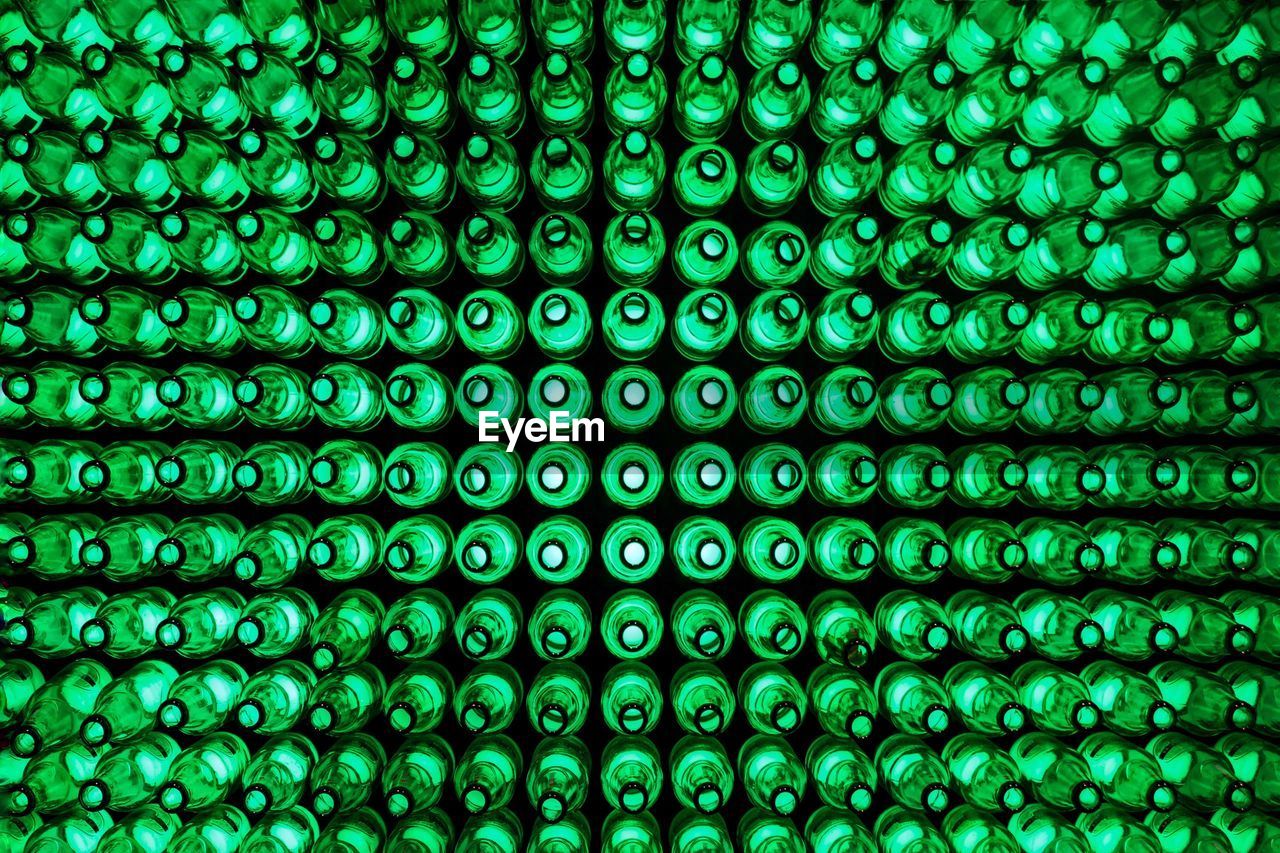 Full frame shot of green bottles