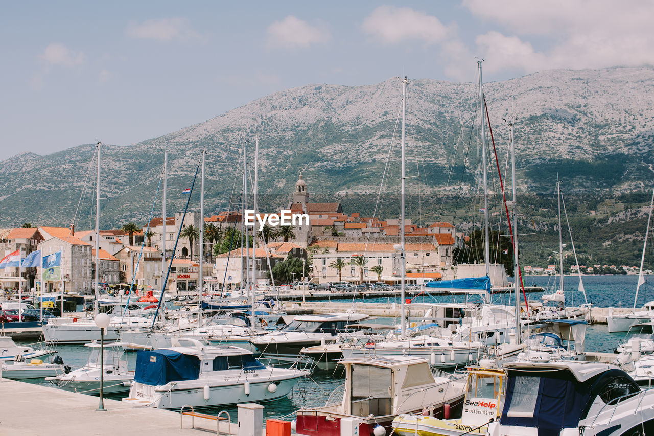 SAILBOATS IN HARBOR