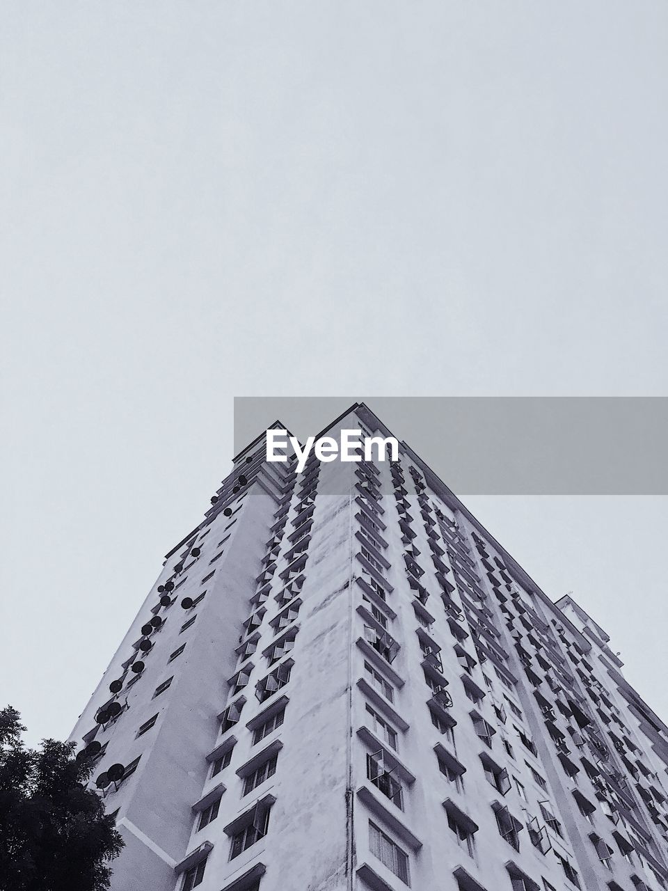 LOW ANGLE VIEW OF BUILDINGS AGAINST CLEAR SKY