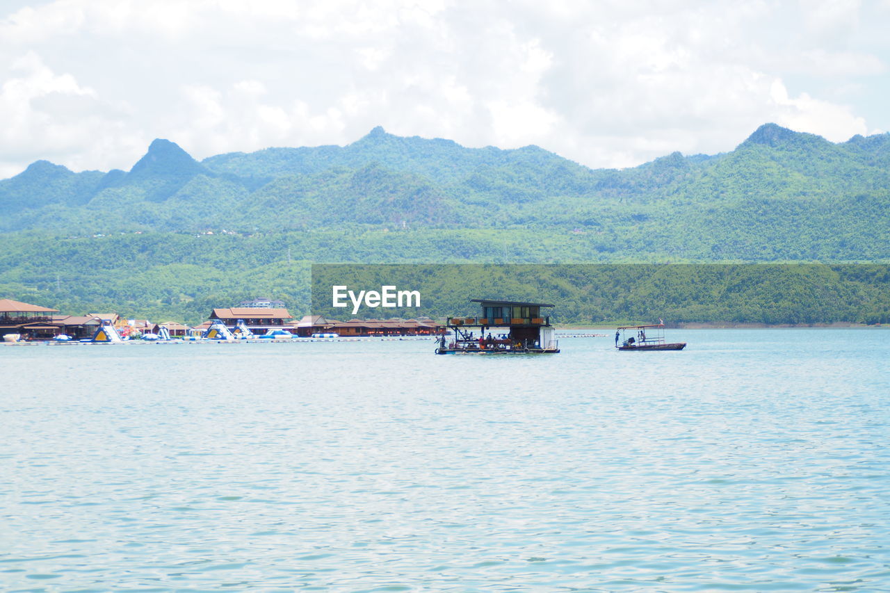 Scenic view of sea against mountains