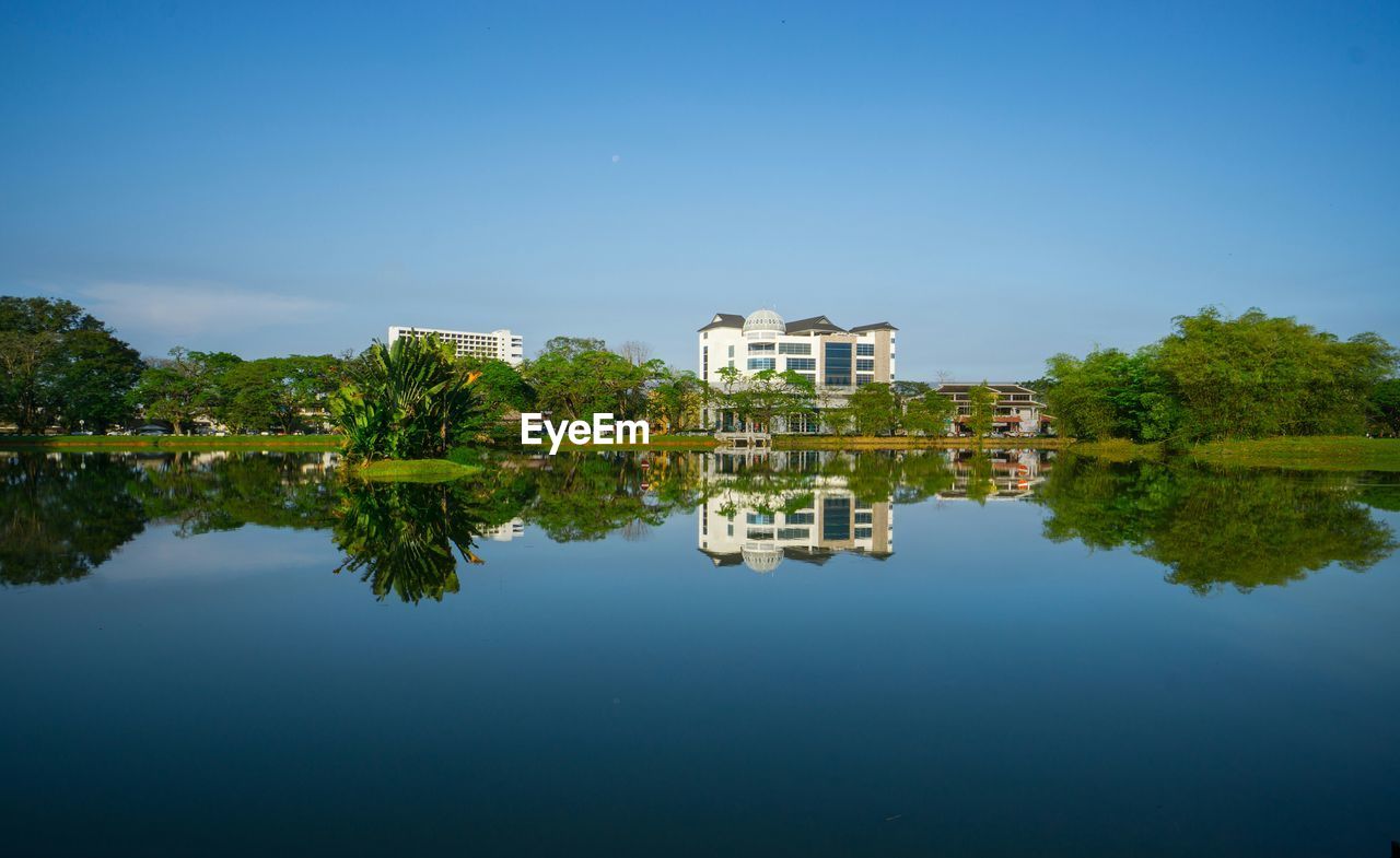 Scenic view of taiping lake gardens against clear blue sky