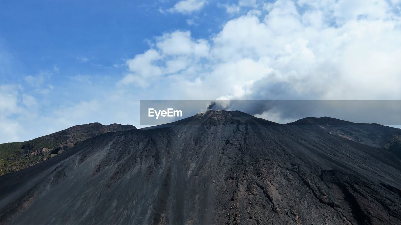 SCENIC VIEW OF VOLCANIC LANDSCAPE AGAINST SKY