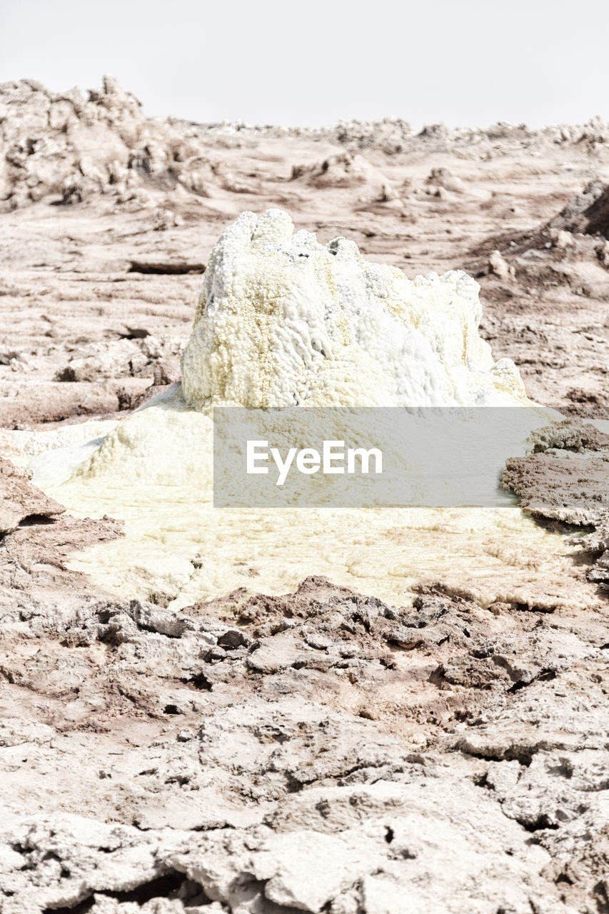 SCENIC VIEW OF ROCKS ON BEACH