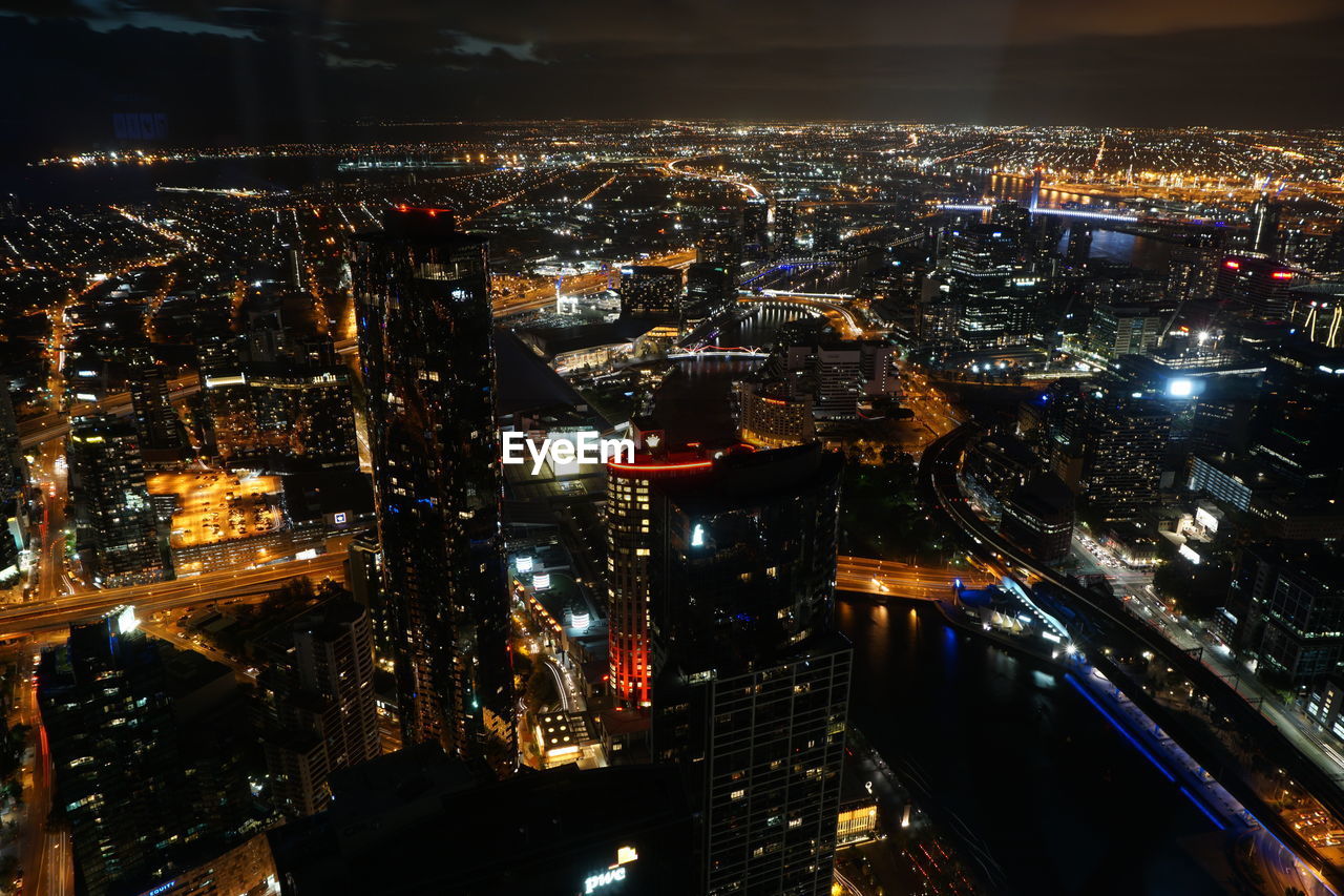 AERIAL VIEW OF ILLUMINATED CITY