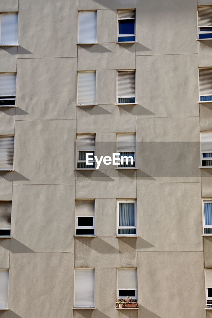 Windows on the facade of the building, architecture in bilbao city, spain