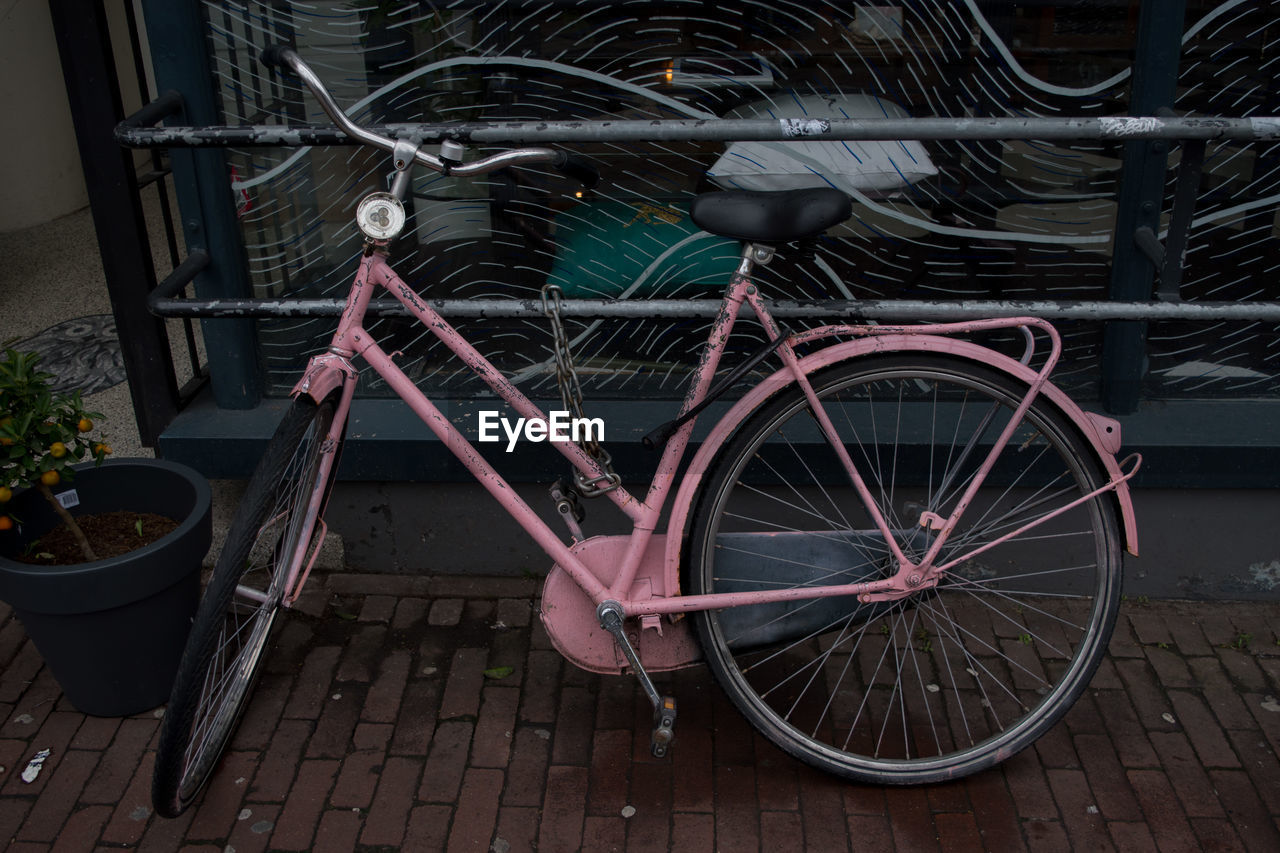 Bicycle tied with railing 