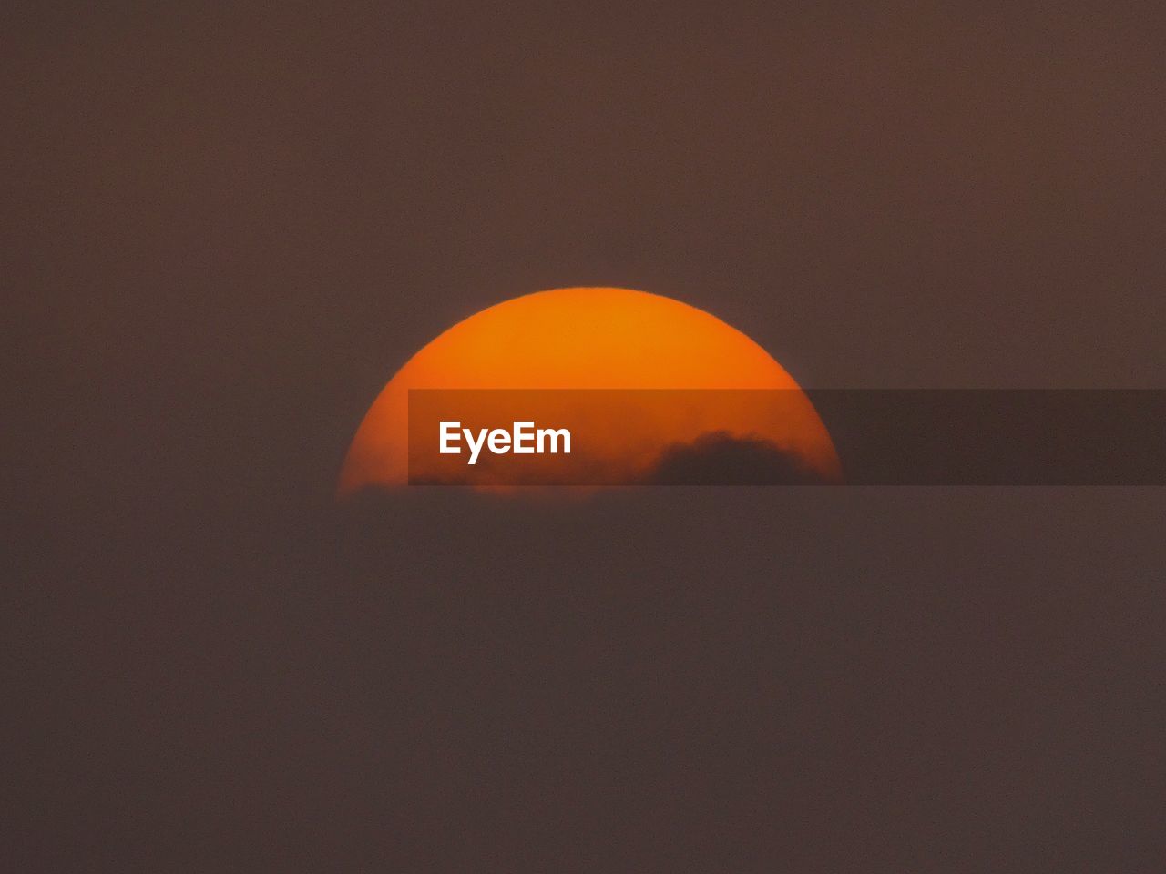 SCENIC VIEW OF MOON AT SUNSET