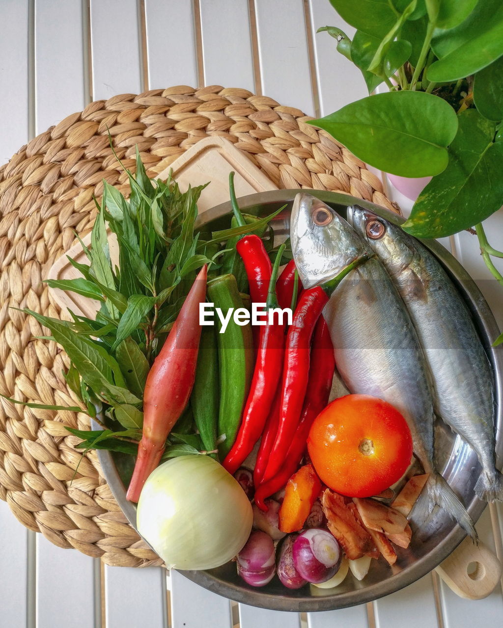 CLOSE-UP OF VEGETABLES IN WICKER BASKET