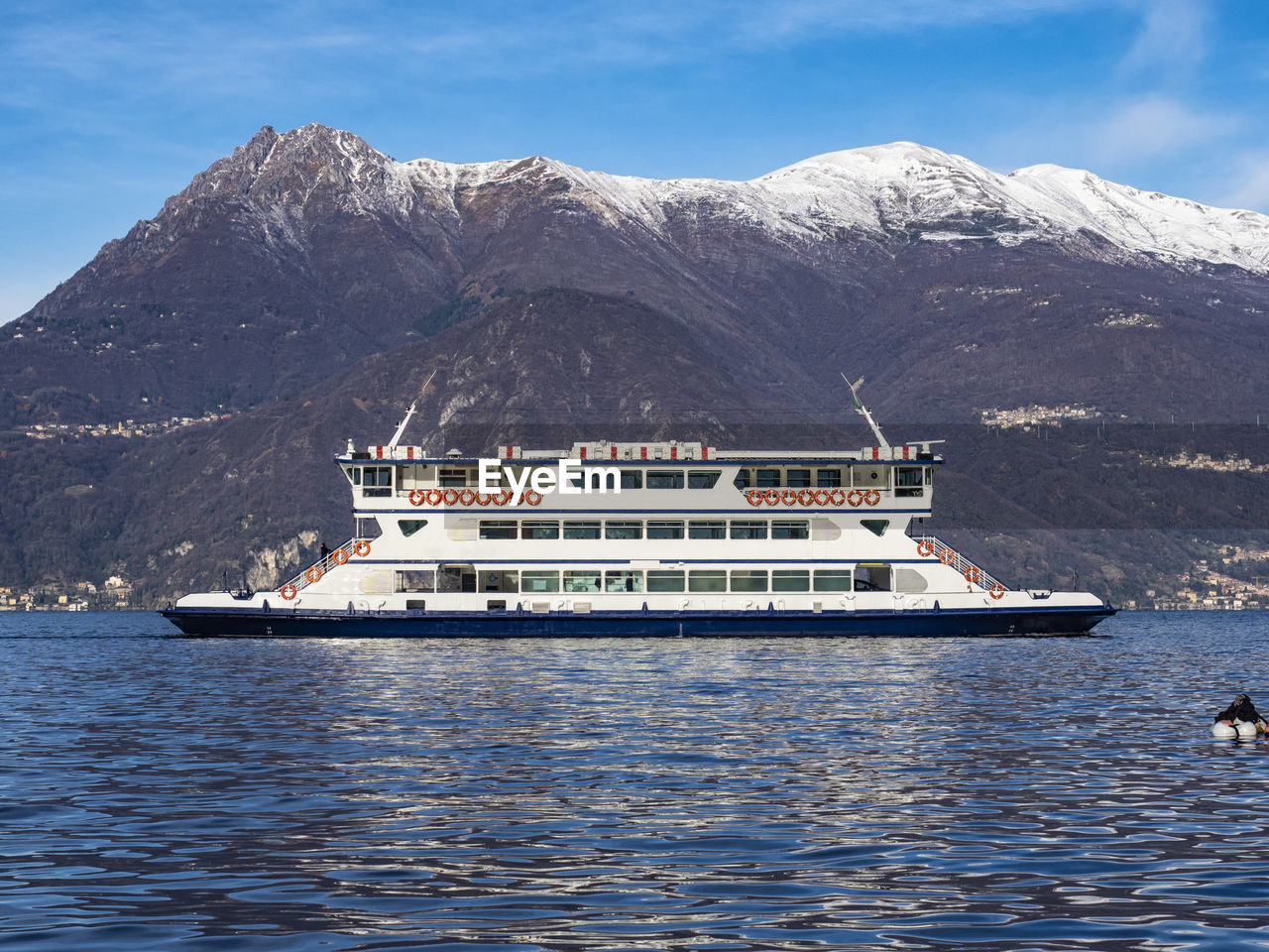 Ferry on lake como in a winter morning