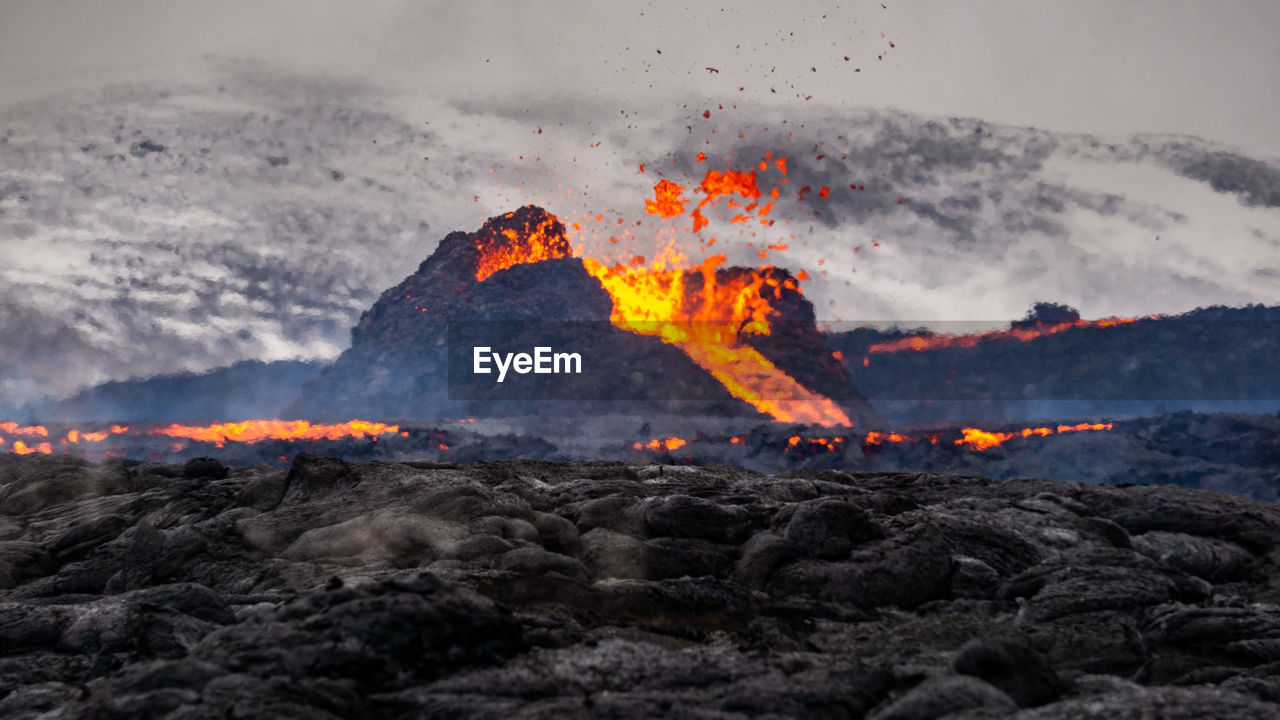 SCENIC VIEW OF VOLCANIC MOUNTAIN DURING SUNRISE